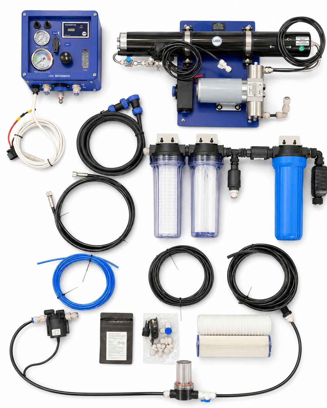 A water filtration system kit laid out on a white background, including a blue control unit, pressure gauge, black and blue hoses, clear filter housings, a blue canister, metal fittings, a cartridge, and small accessories.