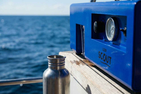 LEDI Scout portable watermaker for sailboat in use on deck at sea
