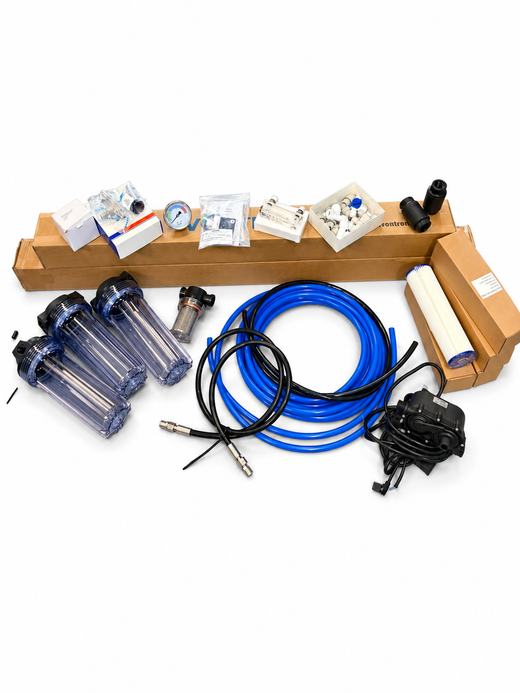LEDI DIY Watermaker Kit parts laid out: membrane boxes, filter housings, intake strainer, pressure gauge, flow meter, fittings, tubing, feed pump and filter cartridges