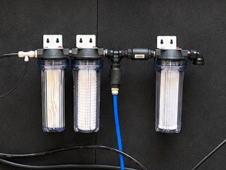 LEDI Modular prefilter module: two pleated prefilters and a carbon block in clear housings